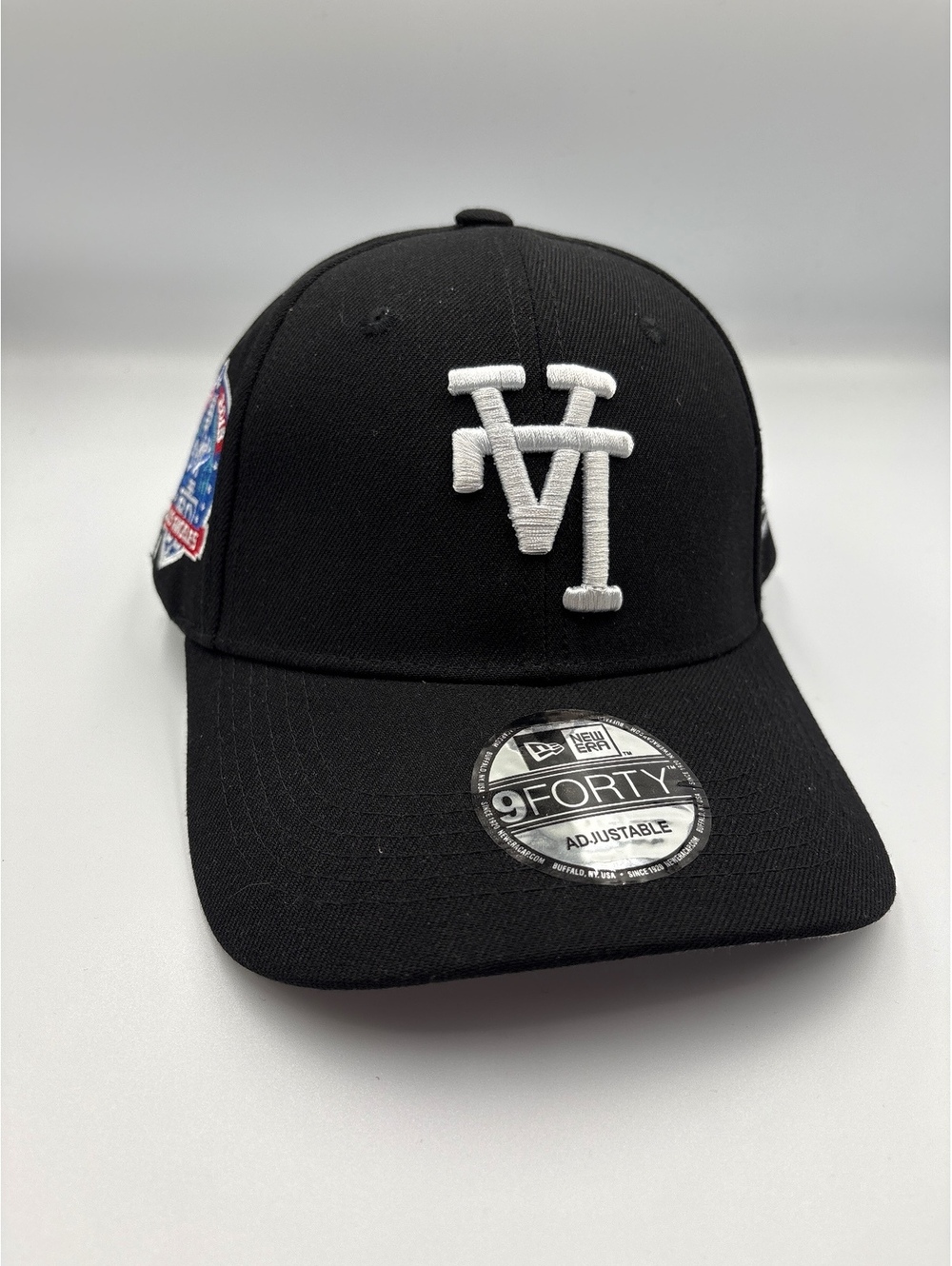 New Era 9FORTY Adjustable Black Baseball Cap with White Embroidered Logo